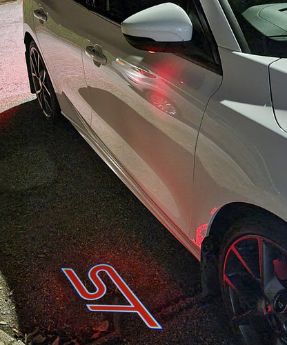 “ST” Emblem Replacement Puddle Unit - MK4 / MK4.5 Focus ST (Multiple Colours)