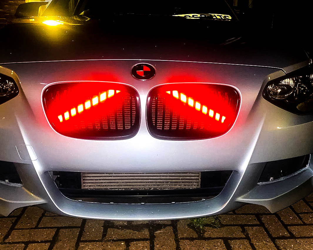Light-Reactive Red V-Brace Wrap Sticker for BMW – Reflective Glow Front Crash Bar / Grille/Grill Bar Vinyl Decal Overlay Kit (2 Strips) | Kidney Grille Accent | Engine Bay Front Brace Cover | V-Bar Sticker | Slam Panel Accent | Radiator Support Wrap