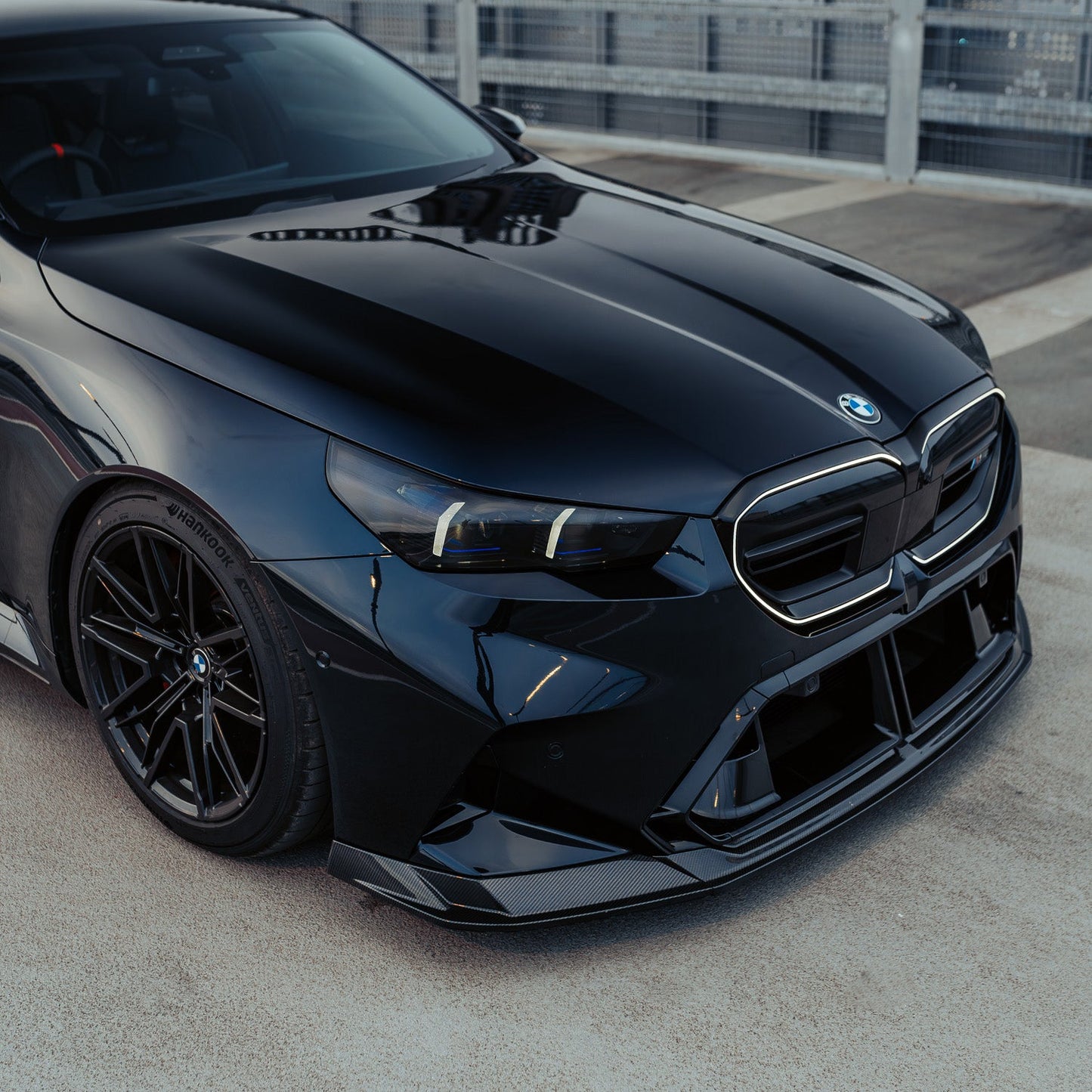MHC+ BMW G90 & G99 M5 SP90 Front Splitter In Gloss Pre Preg Carbon Fibre
