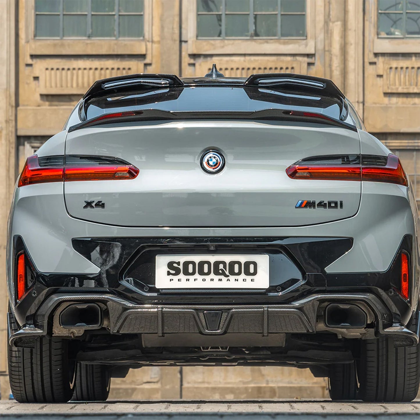 SooQoo BMW F98 X4M Aggressive Roof Spoiler In Gloss Pre Preg Carbon Fibre