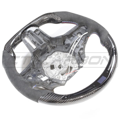 BMW Gxx 5,8,X3,X4,X5,X6,X7,M5,M8,X3M,X4M,X5M,X6M,X7M SERIES CARBON FIBRE / ALCANTARA LED FLAT BOTTOM STEERING WHEEL WITH HEATING