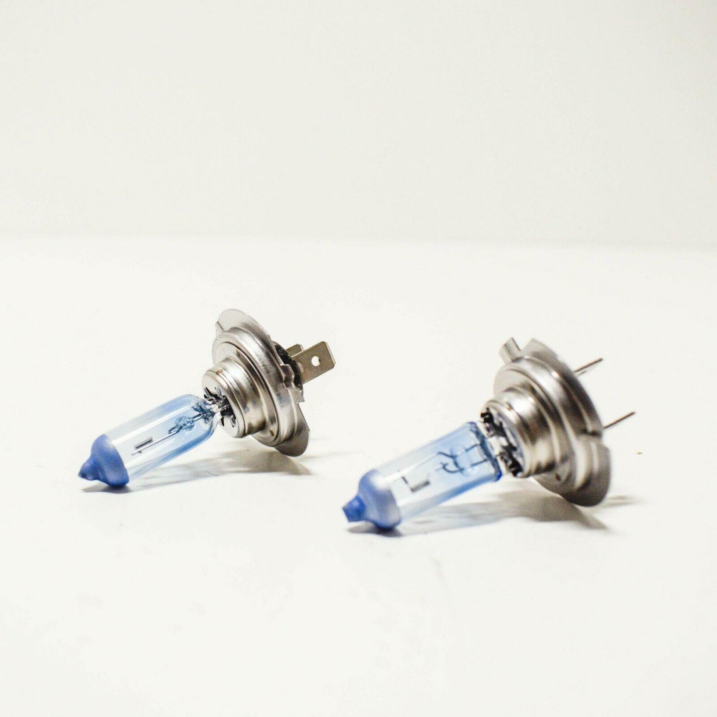 Genuine BMW H7 Blue Halogen Headlight Bulbs  Xenon Look, +30% Brighter  OEM 63112338076 (Pair)  Fits E60 E82 F30 F10 1 2 3 5 Series incl. 135i 340i 550i M5